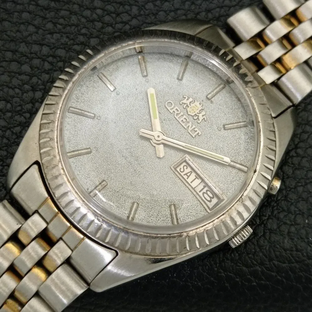 Vintage 1976 Orient Automatic Mens Silver Watch W/daydate & Silver accents